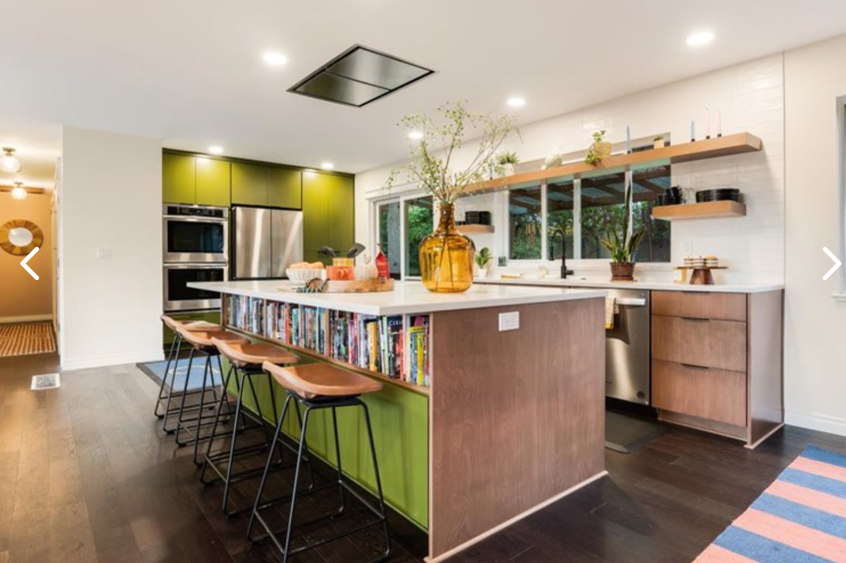 Matte black edge pulls on custom-painted MDF slab cabinet doors