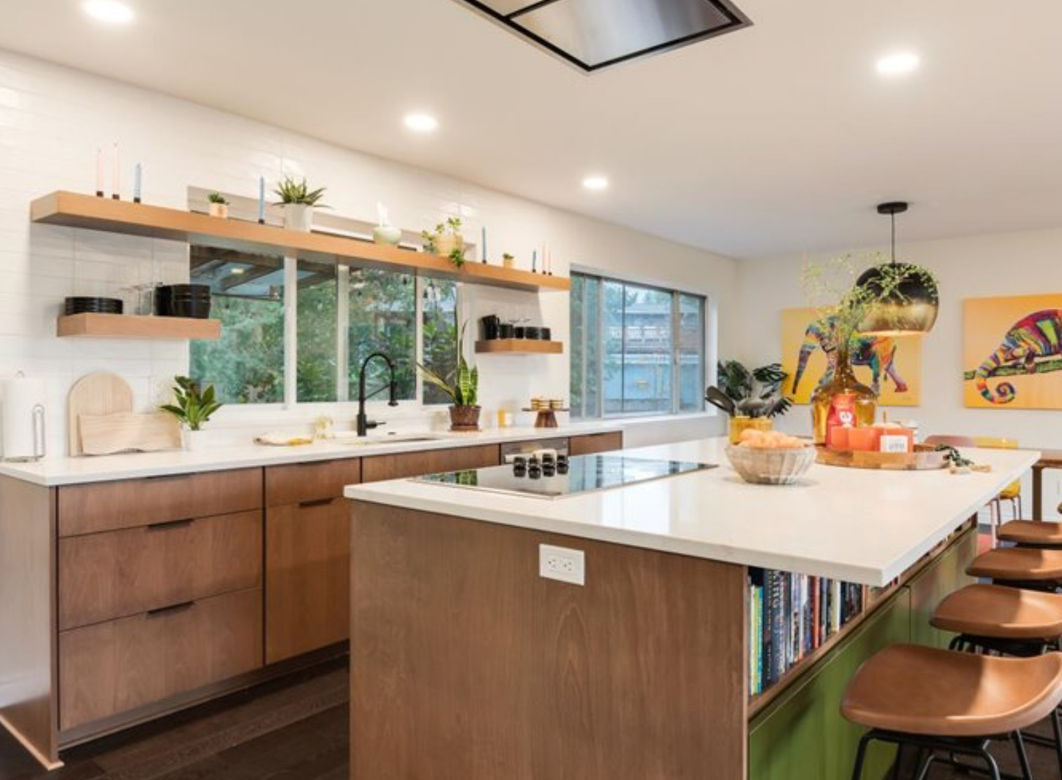 Full-height painted slab pantry cabinets with period-appropriate hardware detail